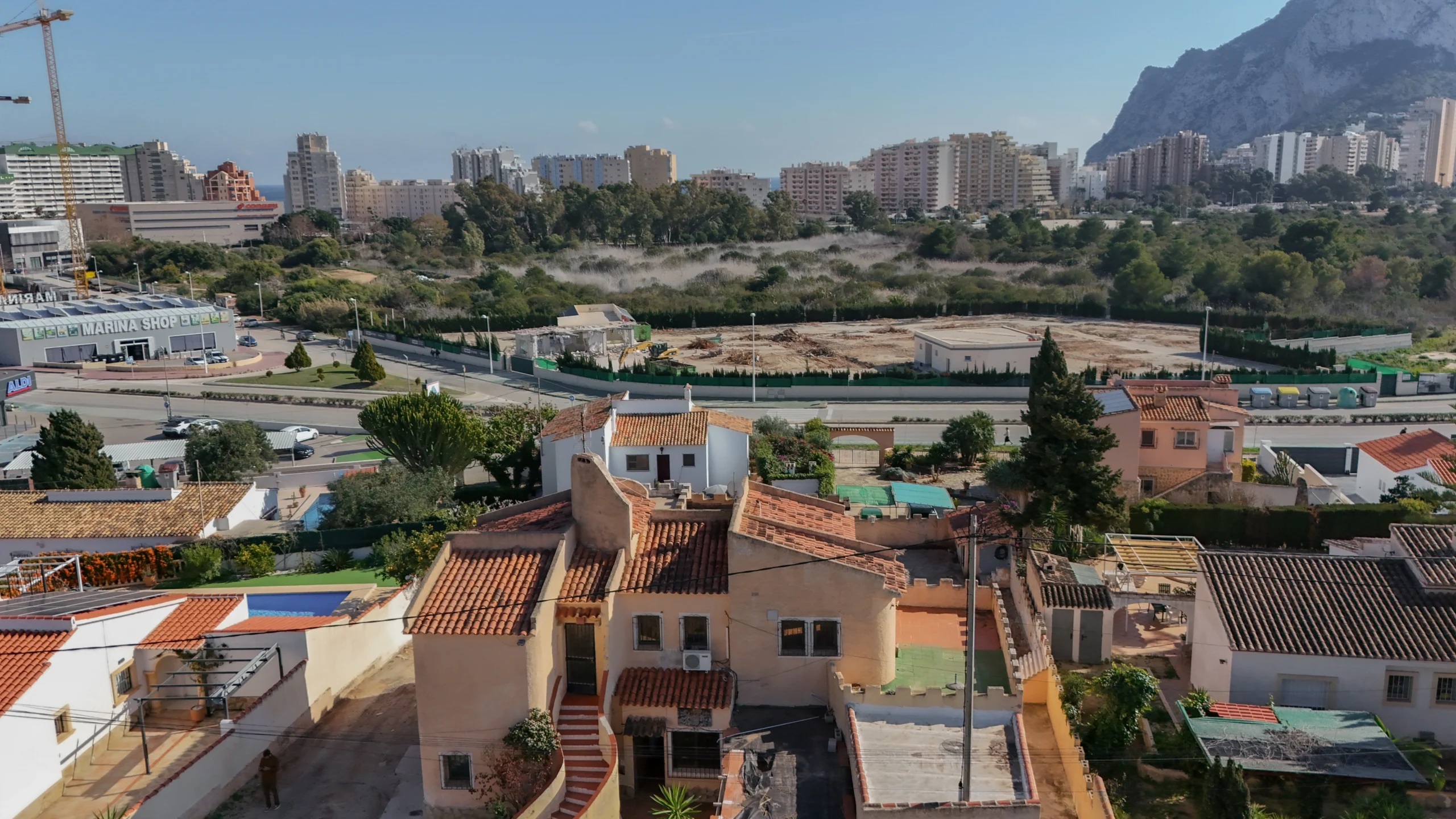 Villa for Renovation in a Prime Calpe Location Near the Beach. - aerial angle showing proximity to town
