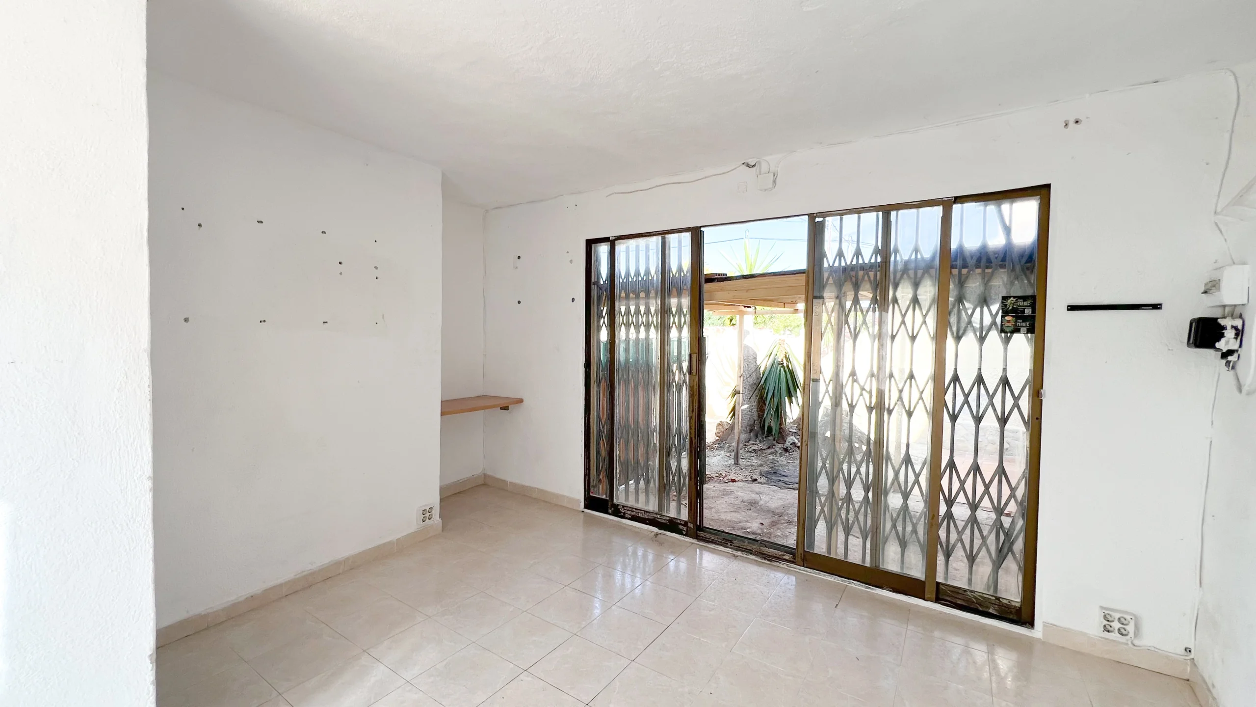 Villa for Renovation in a Prime Calpe Location Near the Beach. - elevated view over pool and house
