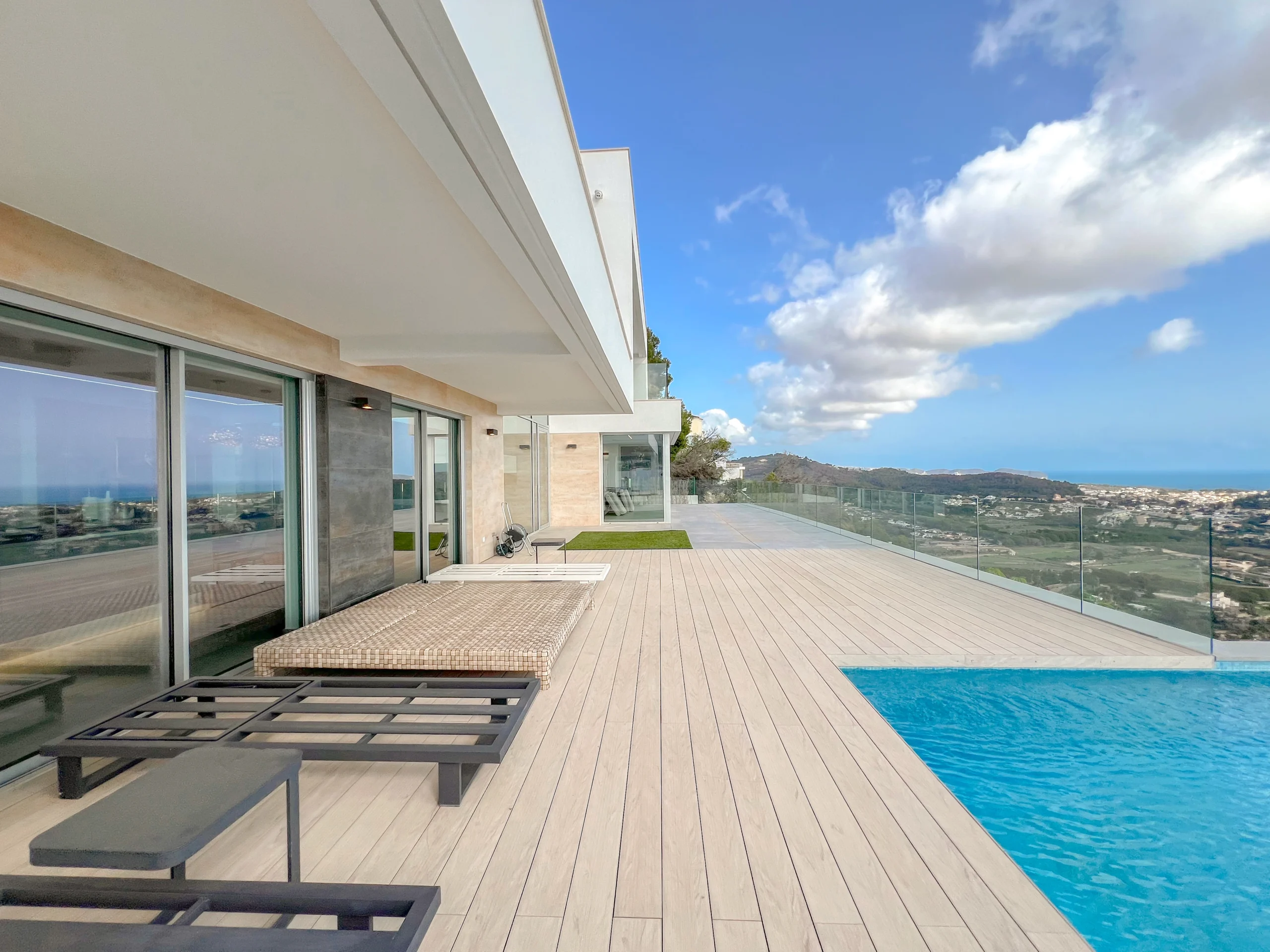 Luxury Modern Villa For Sale In Calpe with Panoramic Sea and Mountain Views. - infinity pool and main terrace