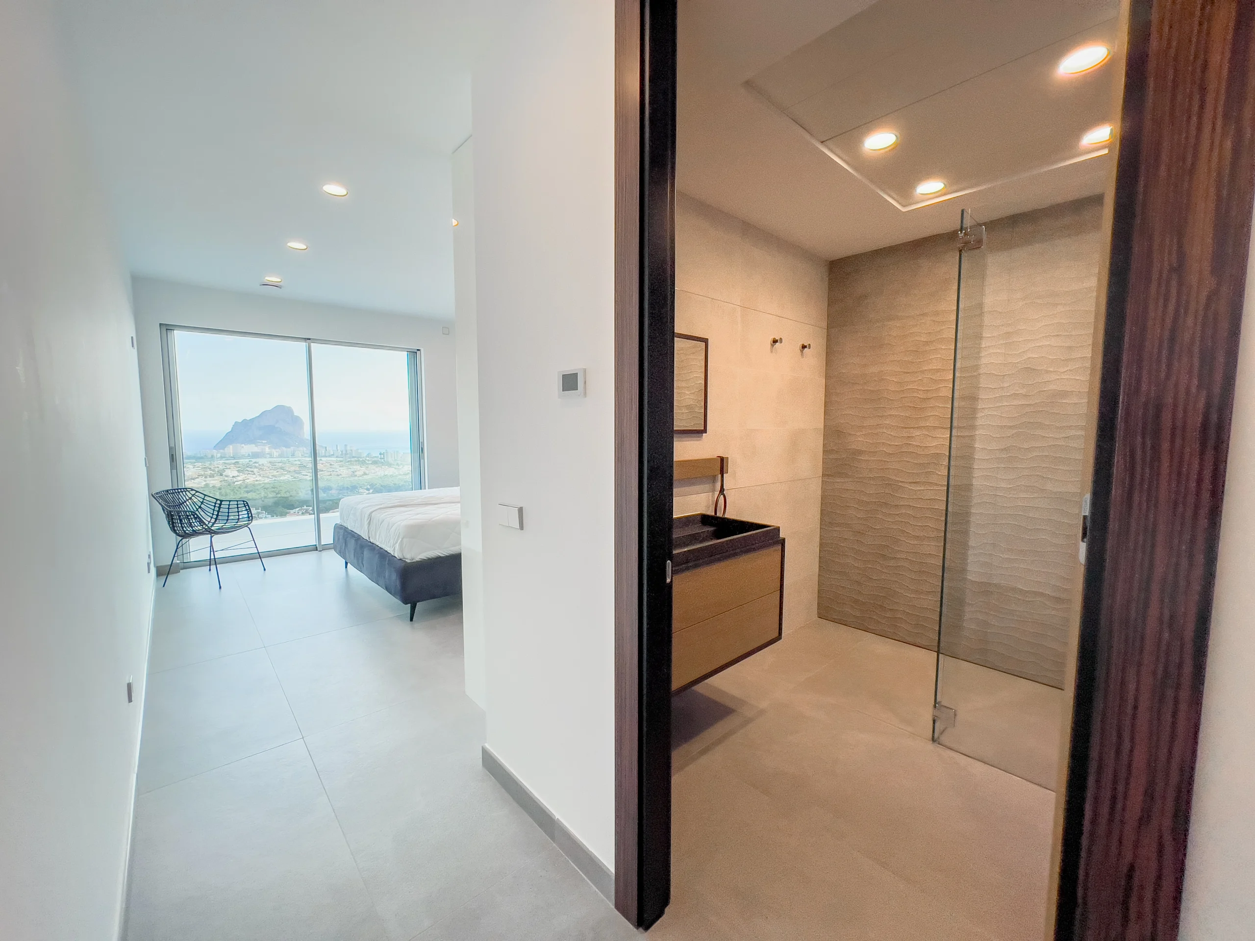 Luxury Modern Villa For Sale In Calpe with Panoramic Sea and Mountain Views. - guest bedroom and en-suite bathroom