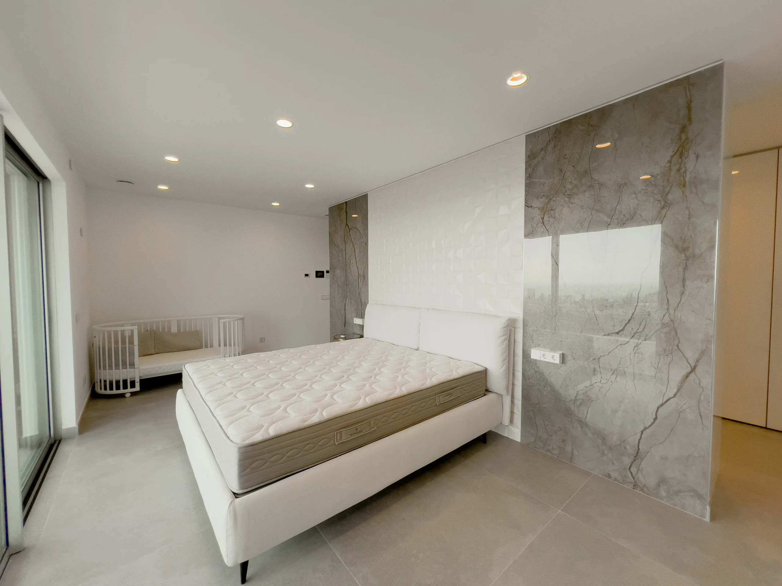 Luxury Modern Villa For Sale In Calpe with Panoramic Sea and Mountain Views. - evening terrace lighting