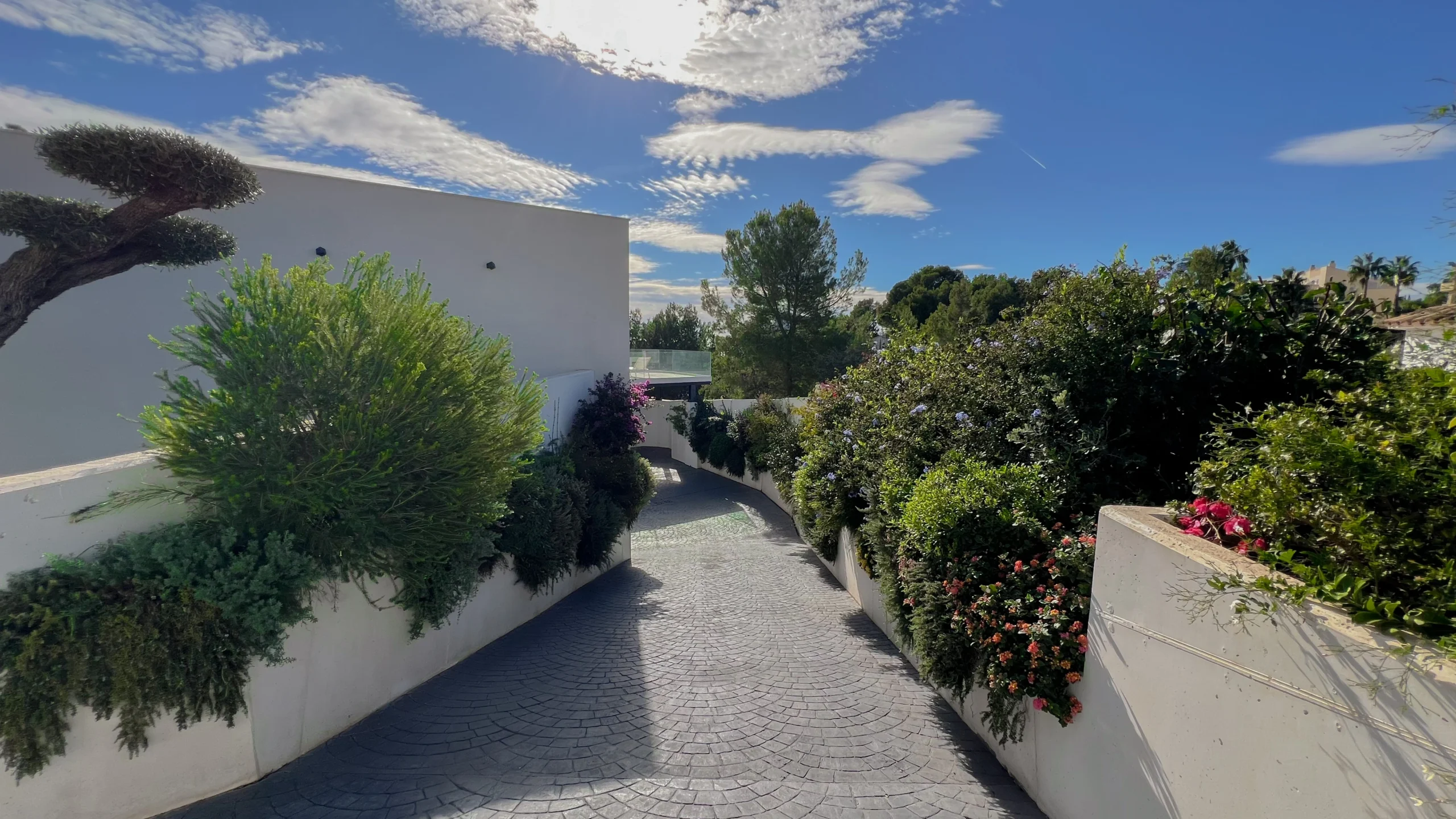 Pathway to sea and rocky shore in front of Altea first line villa for sale