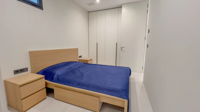 Bedroom with built-in wardrobes in contemporary seafront villa Altea