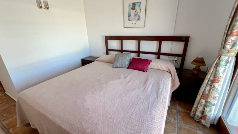 Bright bedroom with double bed and countryside views in Benissa finca