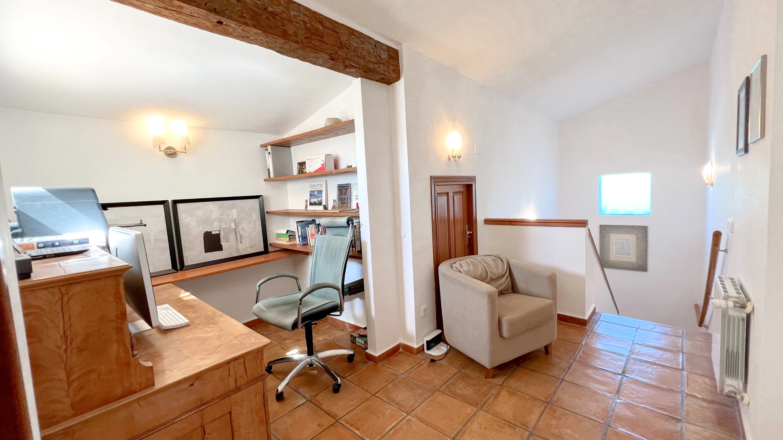Bright workspace with shelving and tiled floors in Benissa finca