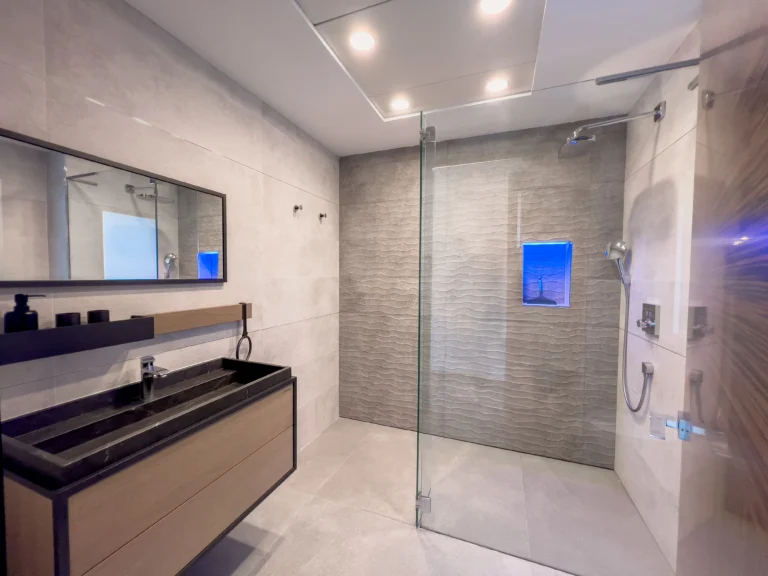 En-suite bathroom with floating vanity and large walk-in shower