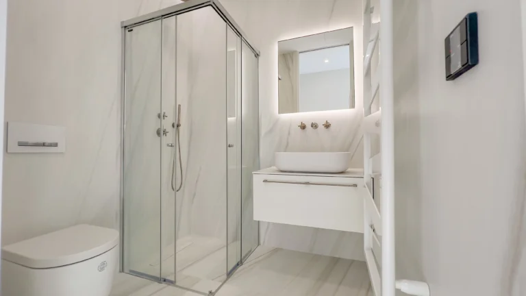 Glass shower bathroom with backlit mirror in luxury Altea property