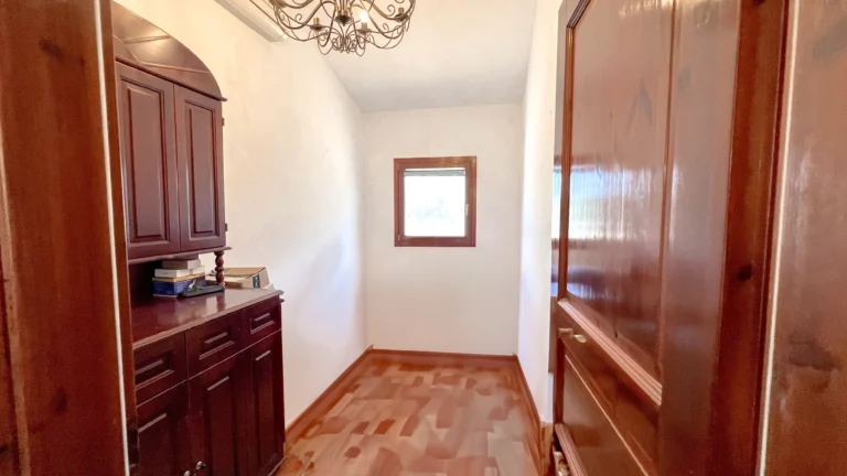 Hallway with wooden cabinets in rustic Benissa villa