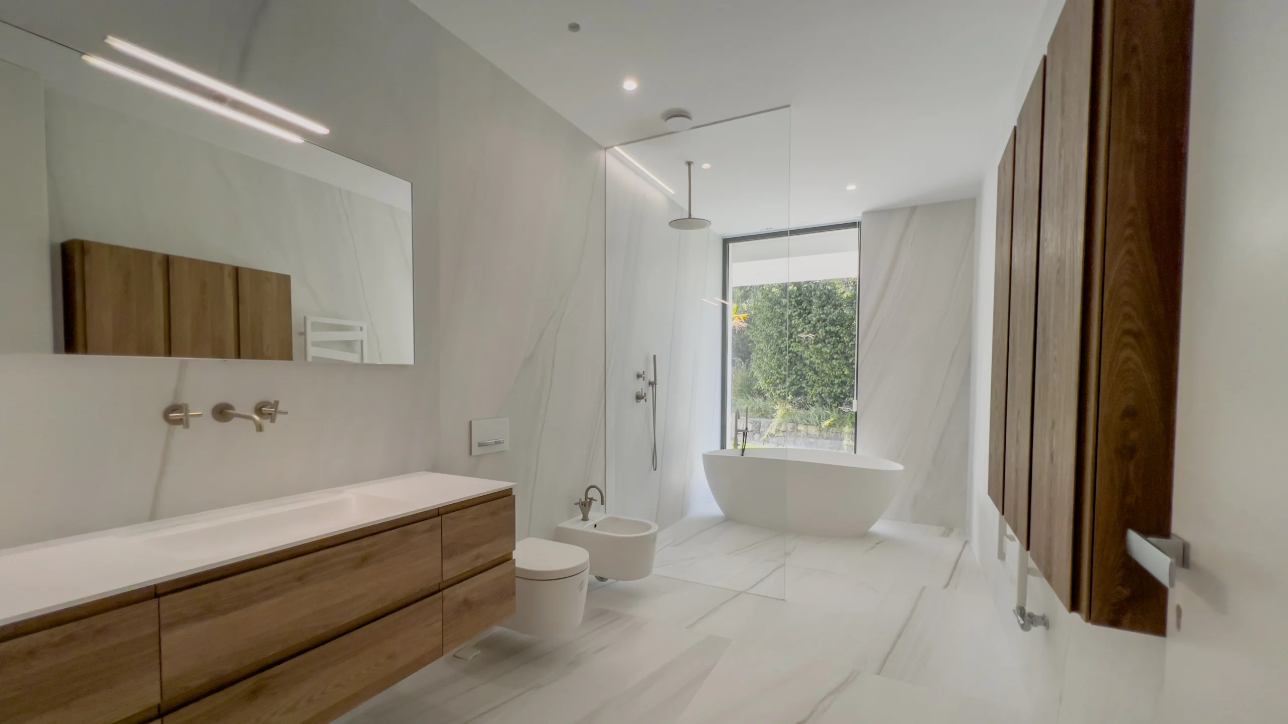 Luxury bathroom with freestanding bathtub and marble finishes in Altea villa