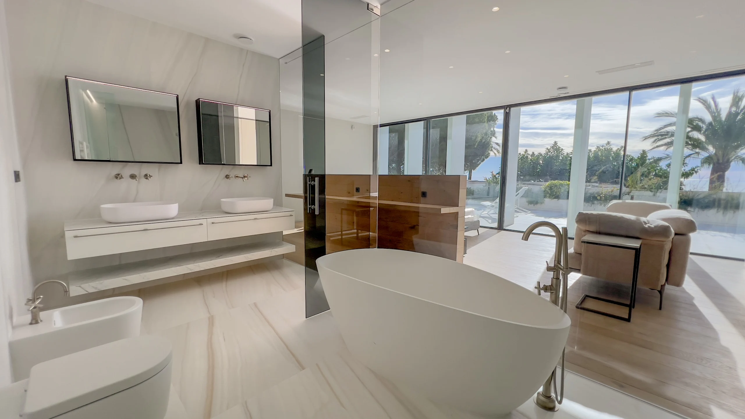 Luxury sea-view bathroom with freestanding tub in modern Altea villa