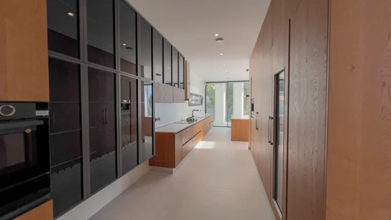 Modern designer kitchen with premium built-in cabinetry in Altea home