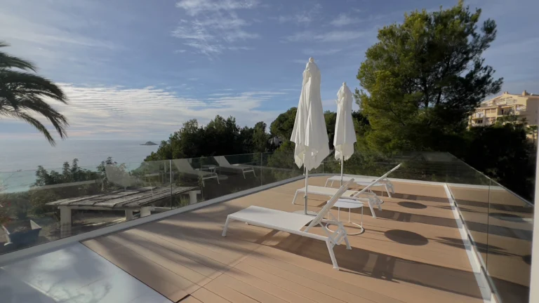 Modern sun deck overlooking the sea at first-line luxury villa in Altea