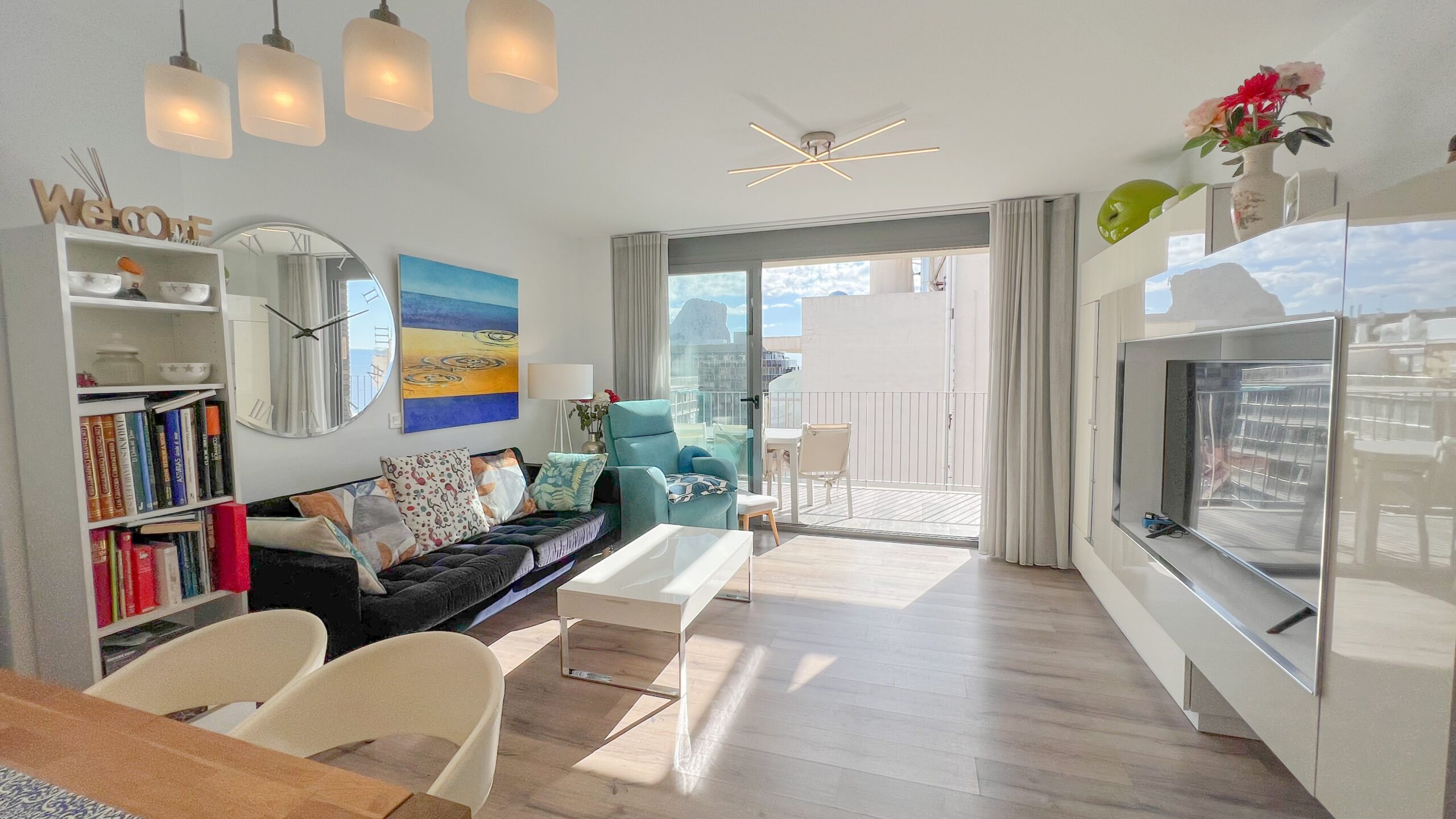 Open living and dining area in IseaCalpe penthouse