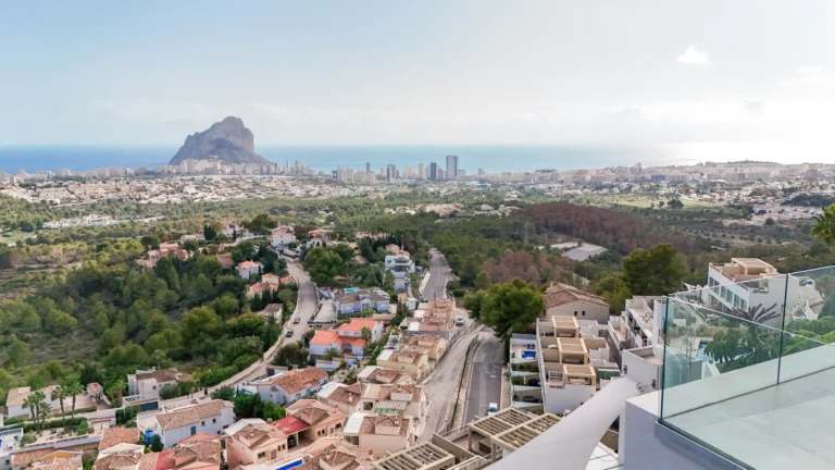 Panoramic sea and mountain view from glass terrace of a modern villa in Calpe