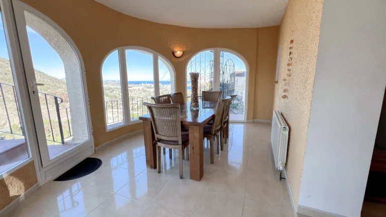 Sea-view dining space with access to terrace in Maryvilla Calpe villa