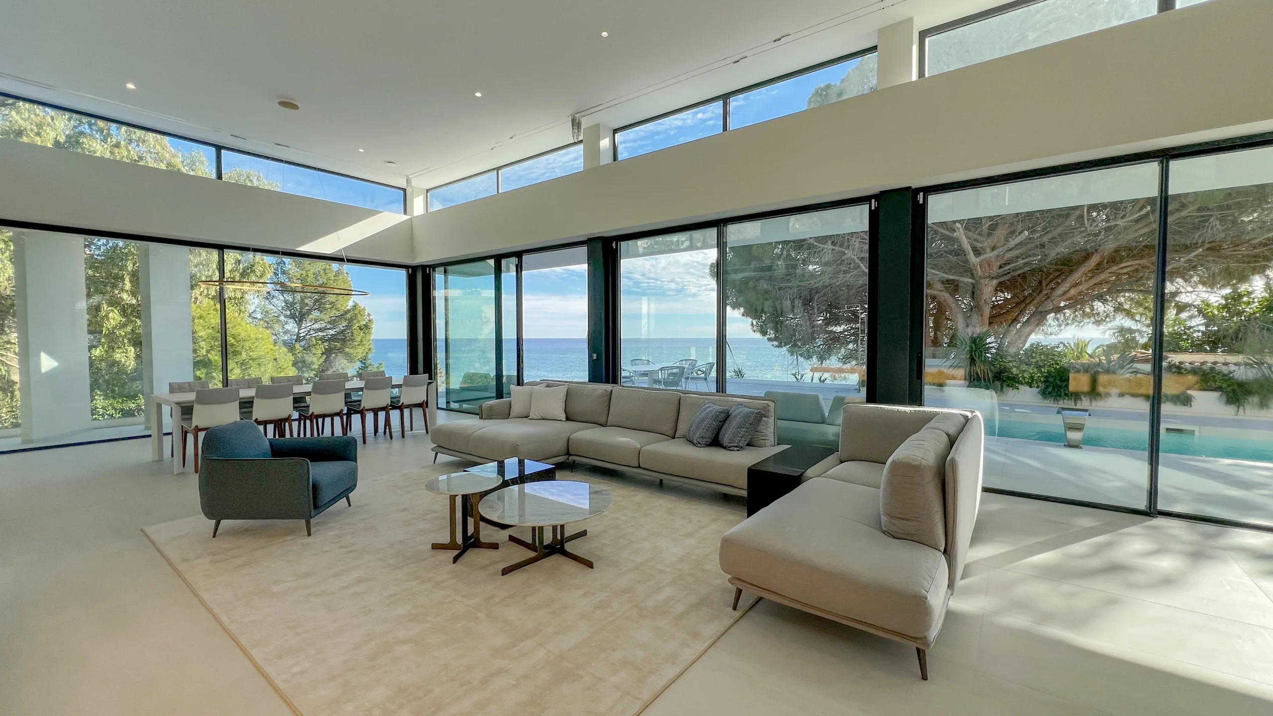 Sea-view living room with floor-to-ceiling glass at modern villa in Altea
