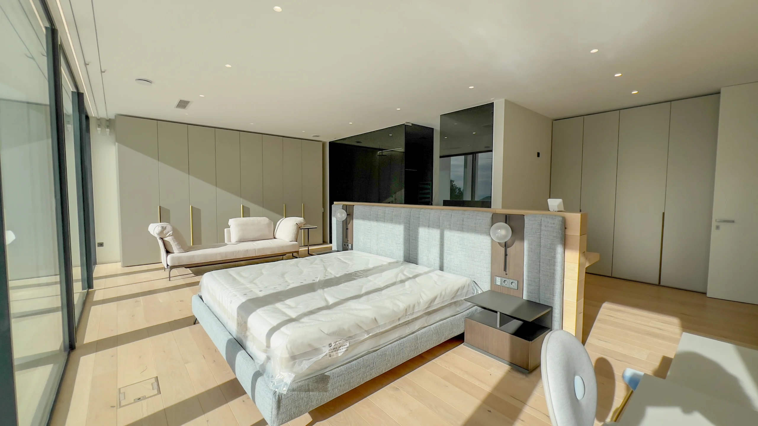 Sea-view master bedroom with floor-to-ceiling glass in Altea luxury villa