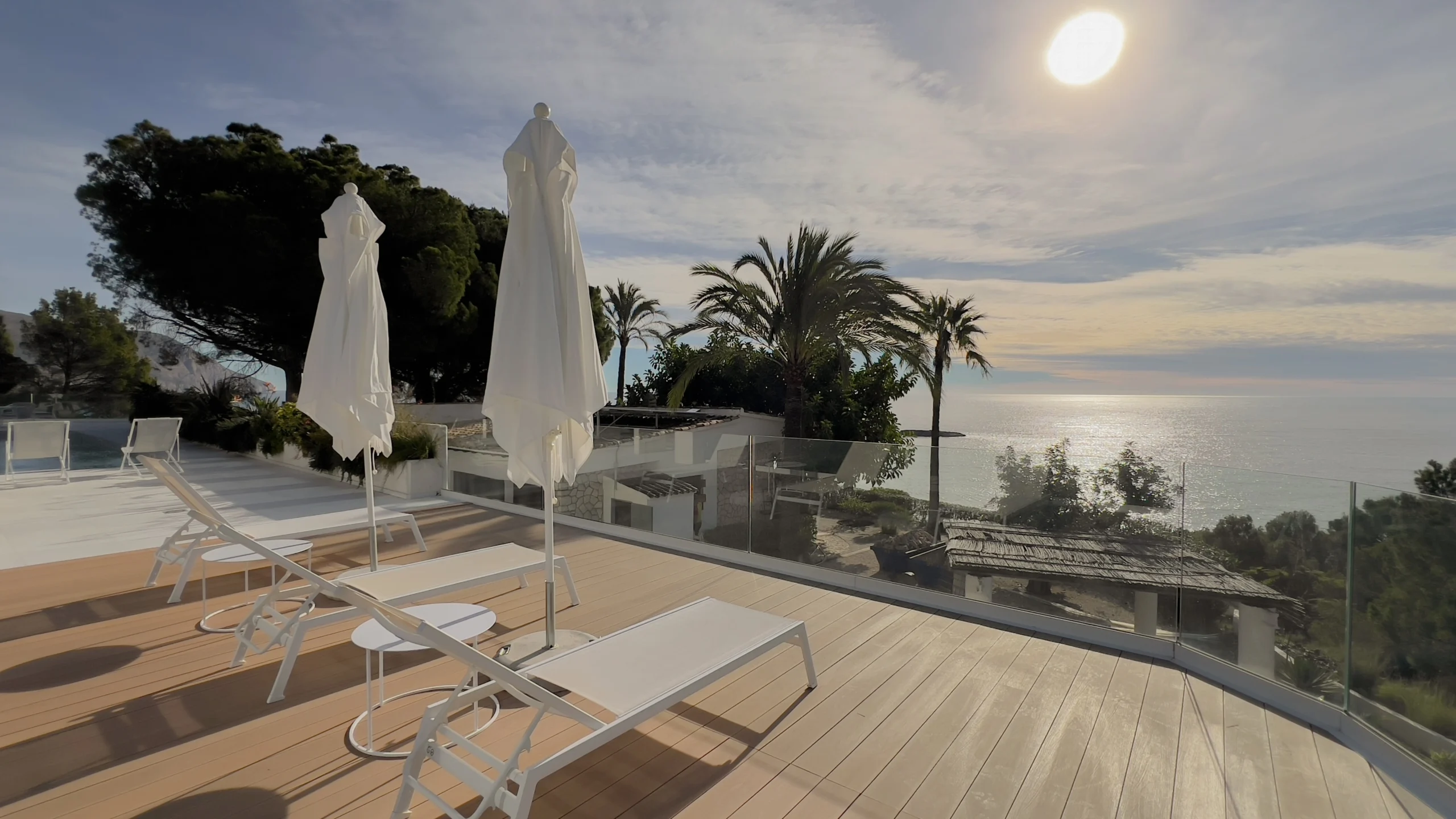 Sun terrace with loungers and panoramic Mediterranean sea views in Altea