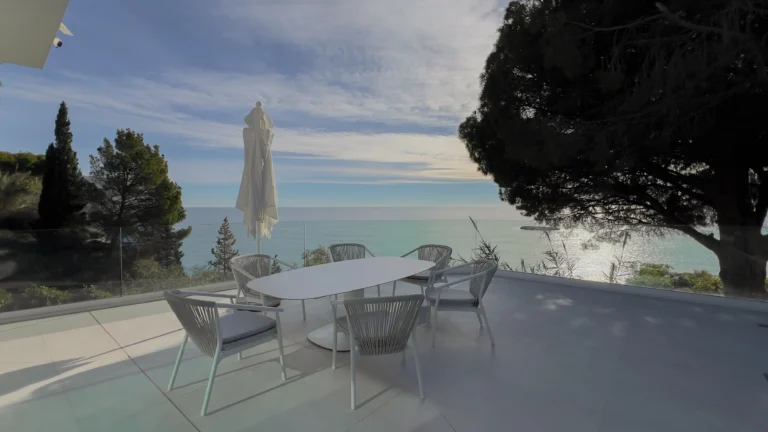 Terrace dining area with sea views at contemporary luxury villa in Altea