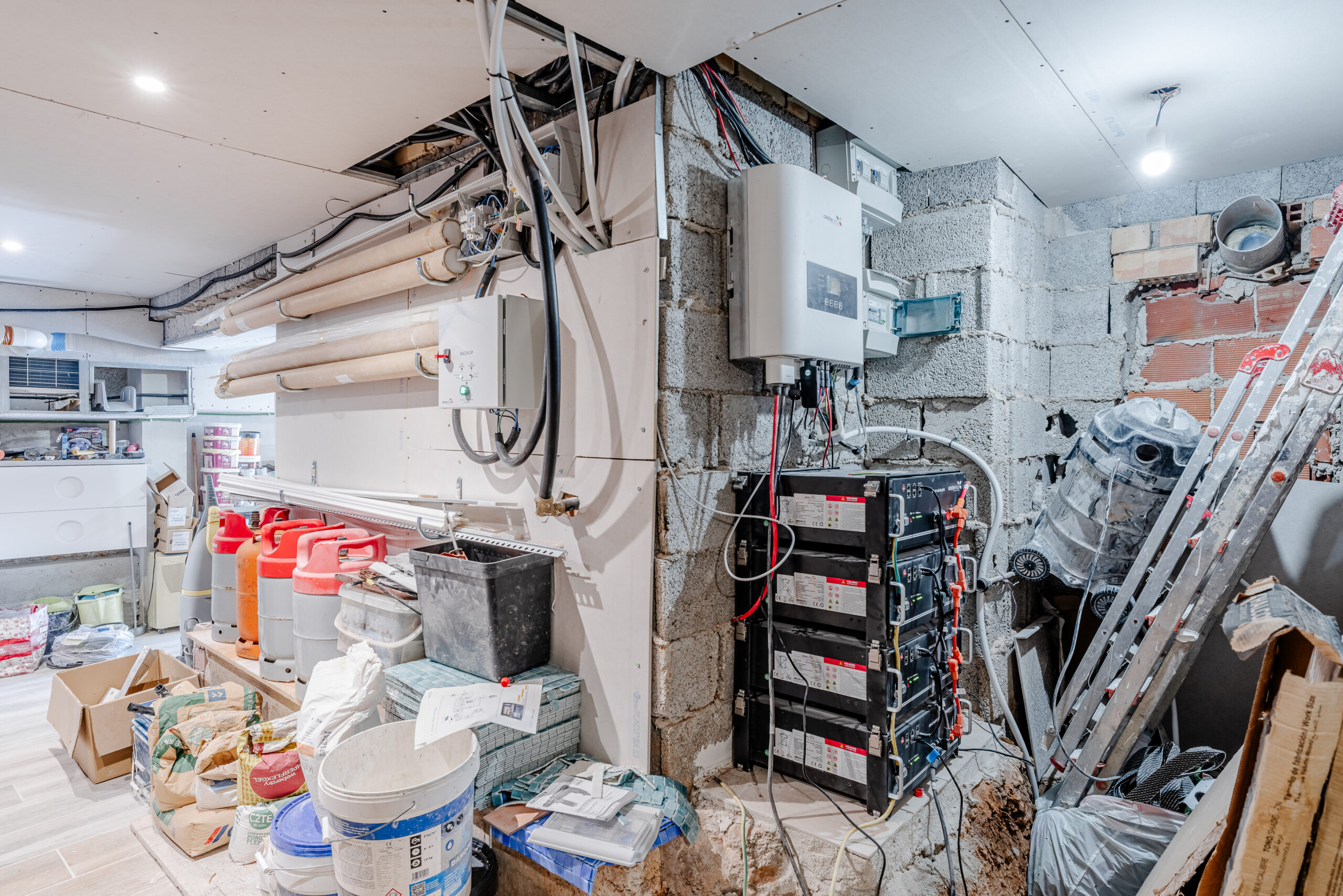 Utility room with solar battery system and storage in a modern eco-friendly villa in Calpe