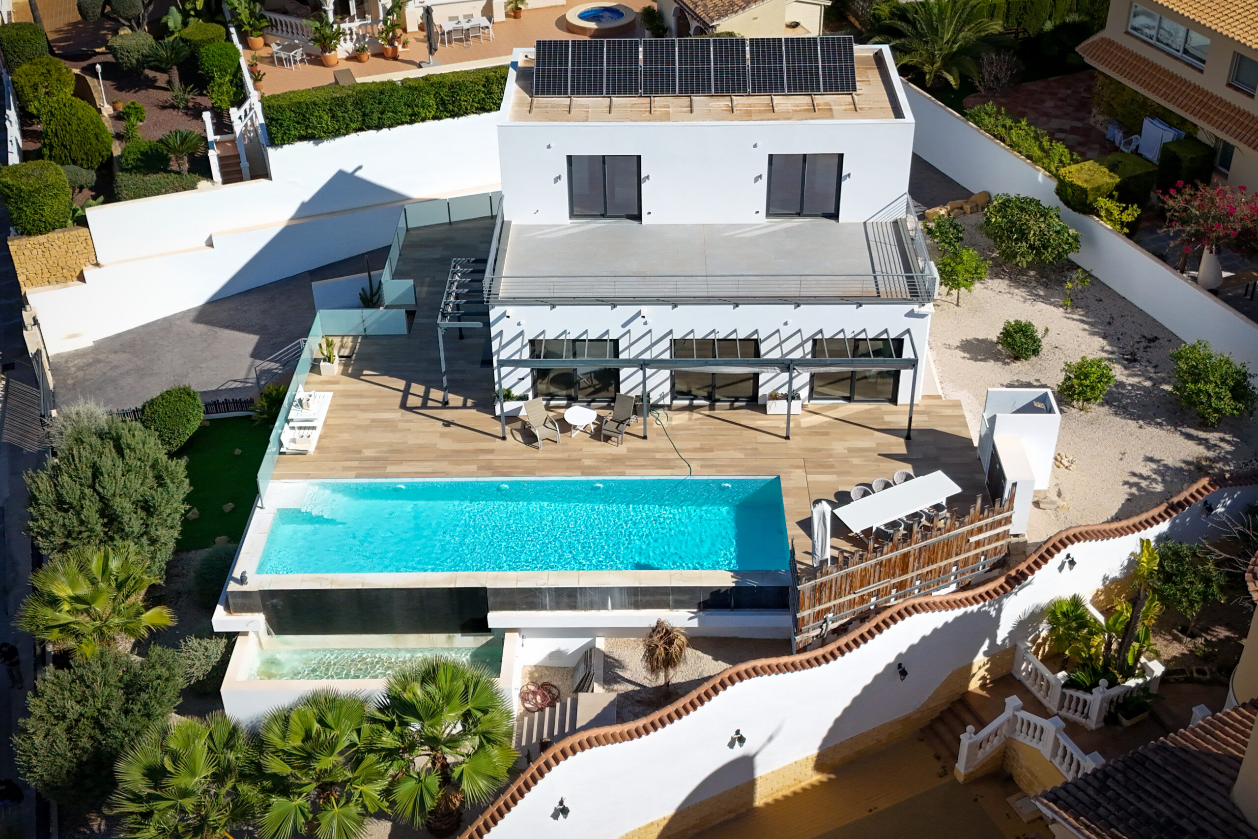 Aerial view of modern villa in Calpe with private pool and terraces