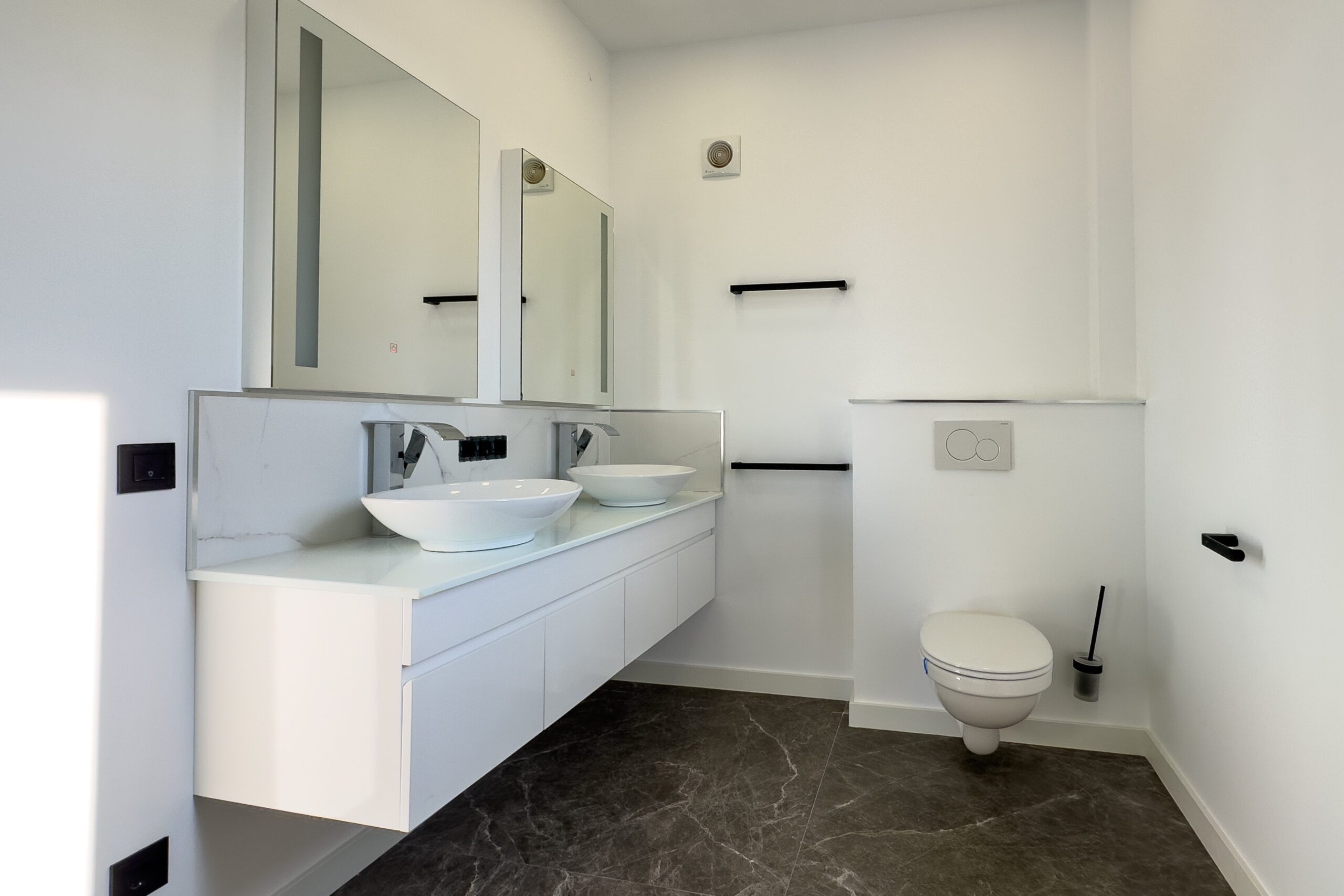 Bathroom with vanity and shower area in a villa in Casanova, Calpe