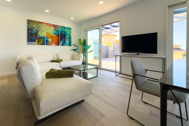 Bright lounge area with terrace access in a modern villa in Calpe