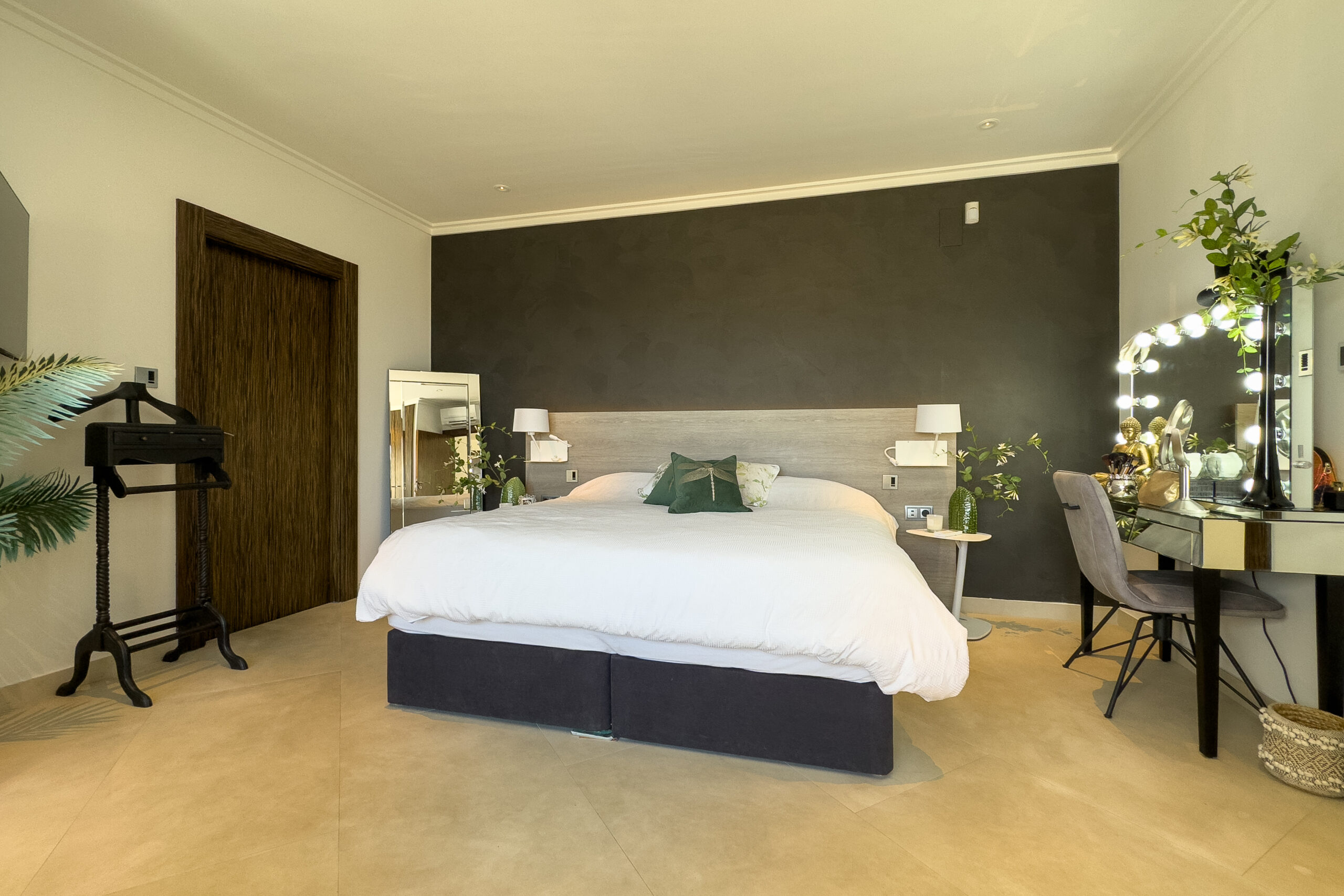 Double bedroom with seating area in a Moraira villa