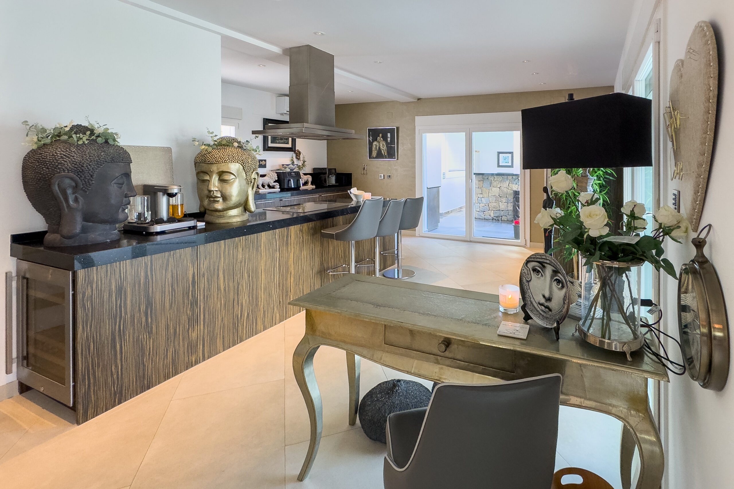 Entrance area with console table leading into the kitchen in Moraira villa