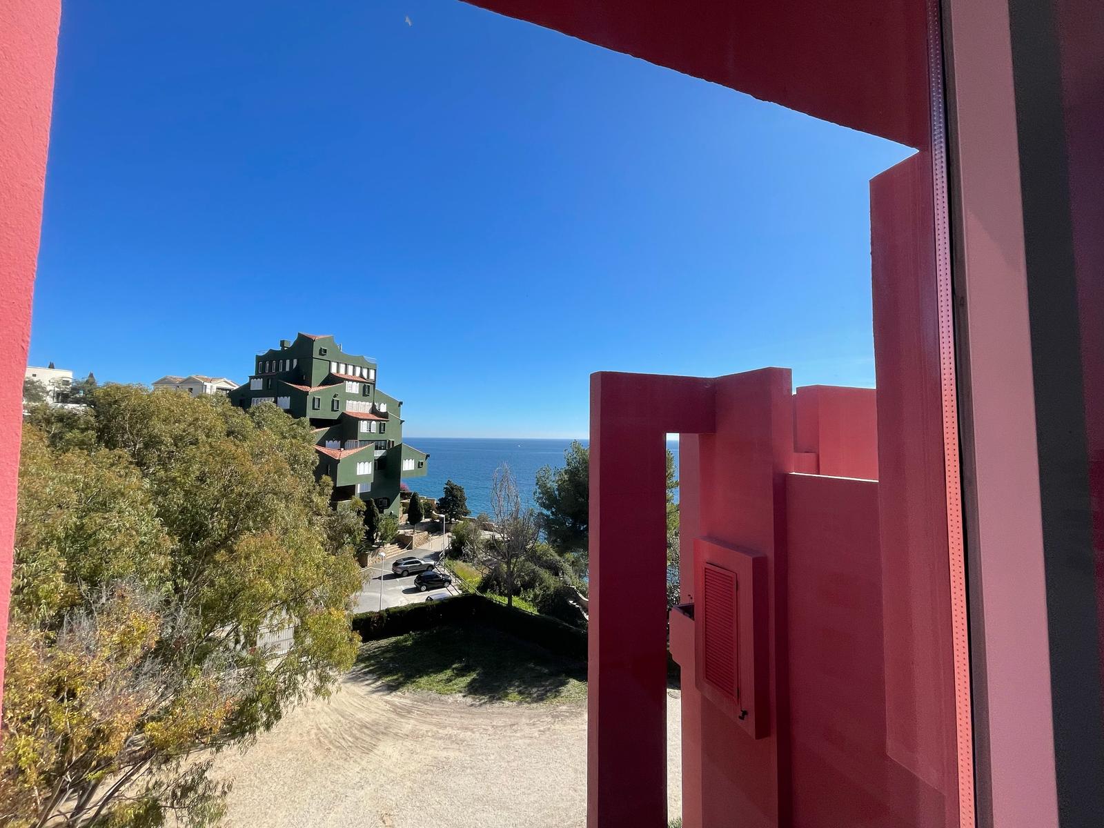 Exterior walkway and sea view at La Muralla Roja, Calpe