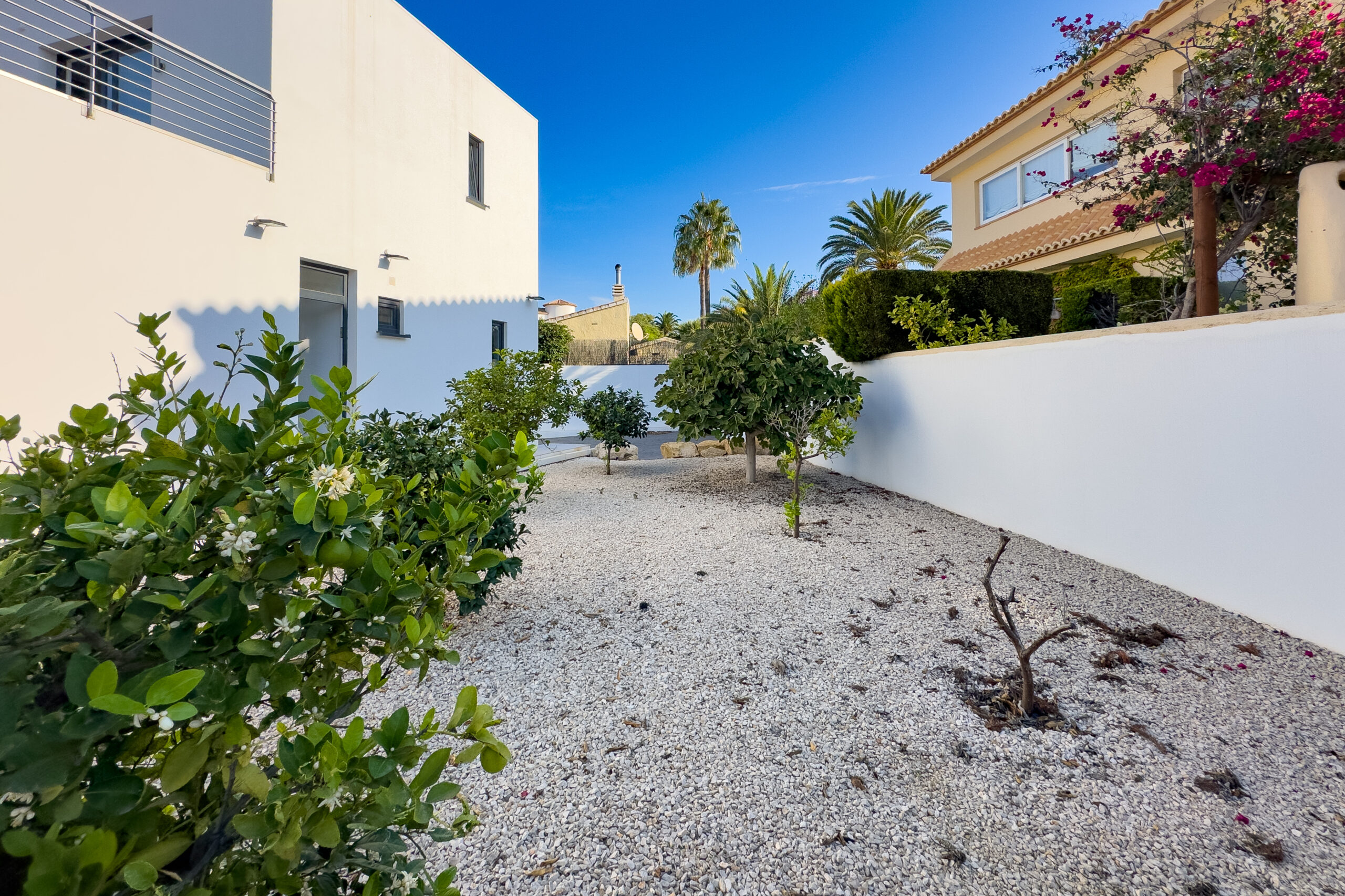 Garden area with planting beds at a villa in Casanova, Calpe