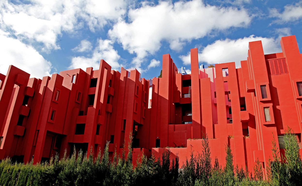 Iconic red facade of La Muralla Roja building in Calpe