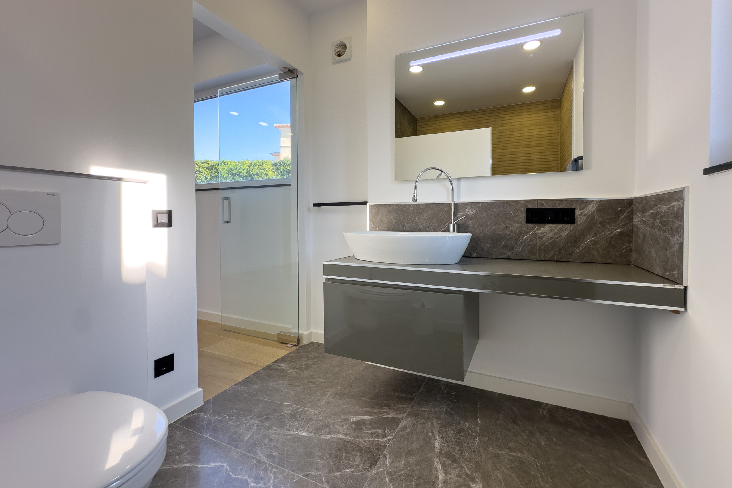 Modern bathroom with vanity unit and walk-in shower in Casanova, Calpe villa