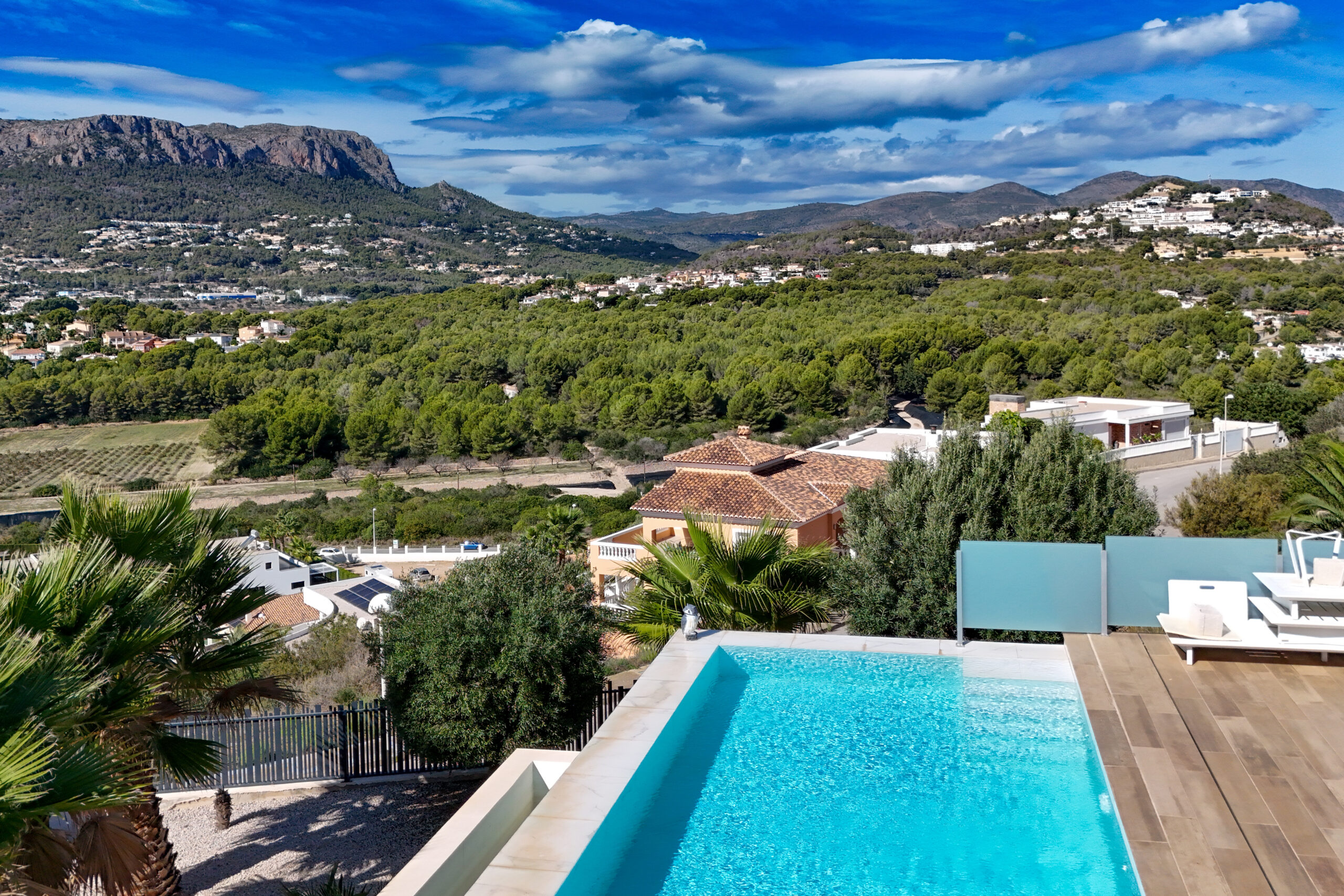 Open mountain views over Calpe from the pool at a Casanova villa