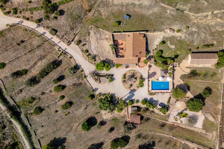 Aerial view of a historic luxury finca in Benissa with private pool, large plot, Mediterranean gardens and countryside surroundings