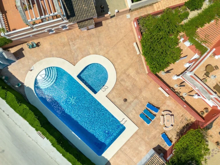Aerial view of communal pool near bungalow in La Vallesa Calpe