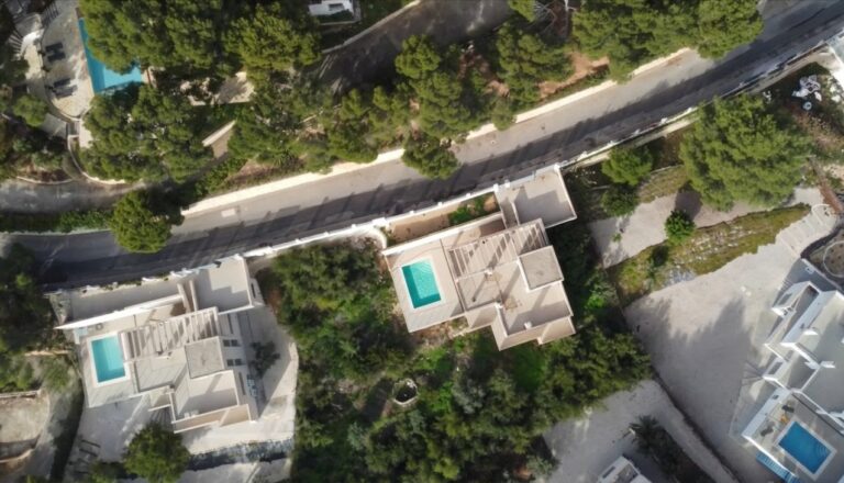 Aerial view of luxury villa plot with private pool in Altea