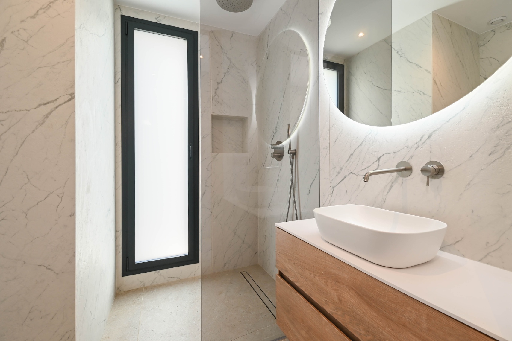 Bathroom with walk-in shower at luxury villa near La Fustera Beach