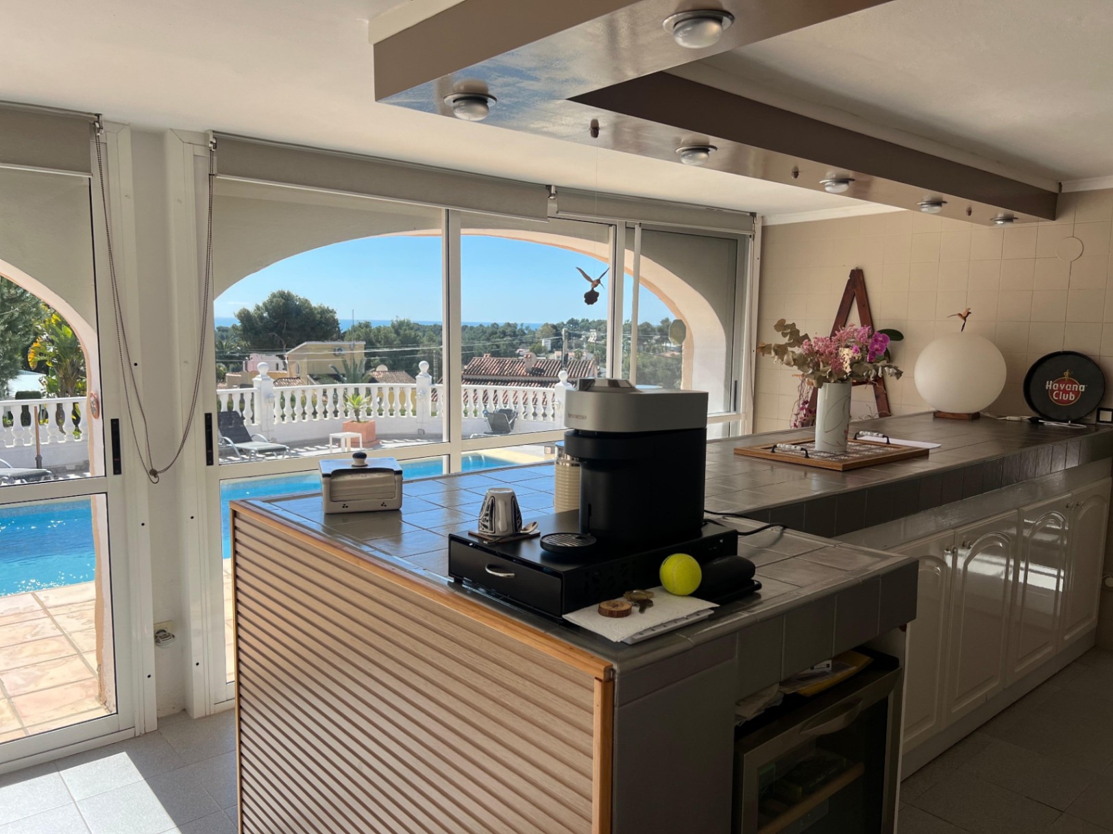 Bar area with terrace and pool access at villa in Buena Vista Benissa