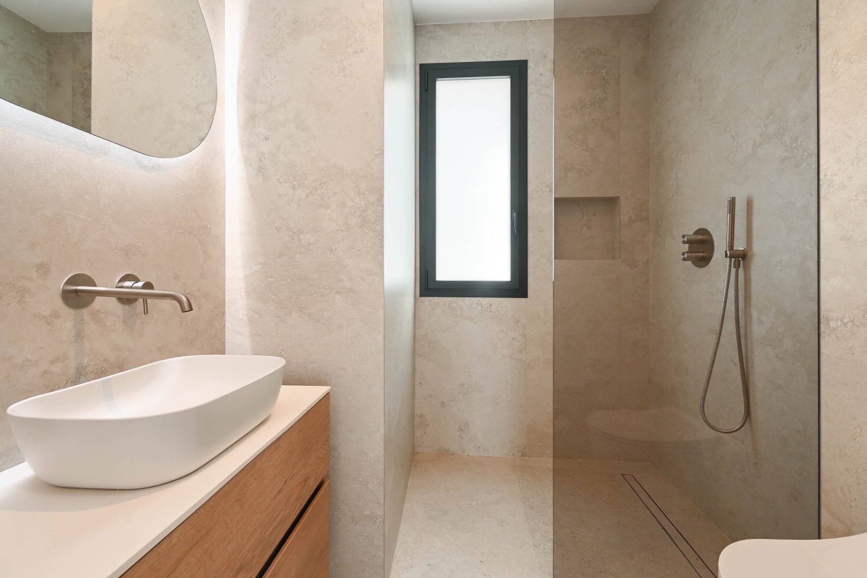 Bathroom with walk-in shower at luxury villa near La Fustera Beach