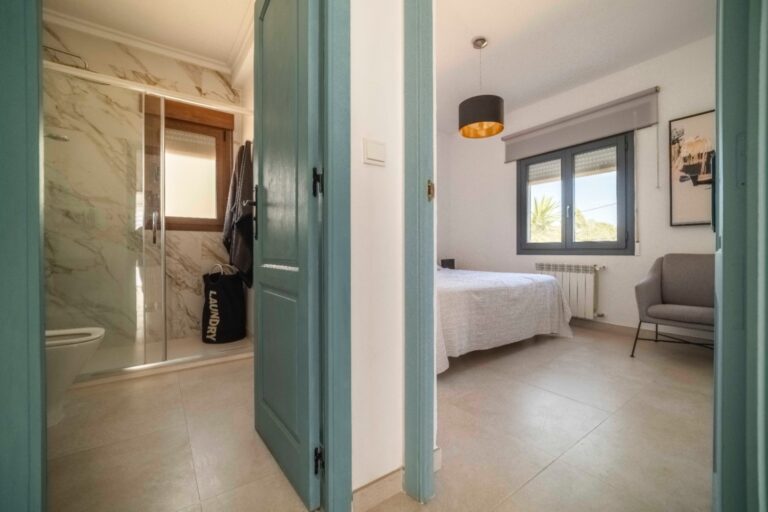 Bedroom entrance inside renovated Ibiza-style villa in Calpe
