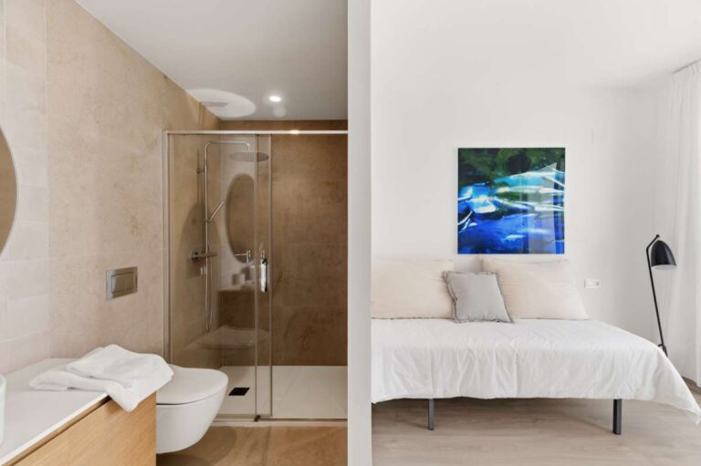Bedroom inside a modern villa in Altea Hills with en-suite bathroom, walk-in shower, neutral interiors and bright modern finish