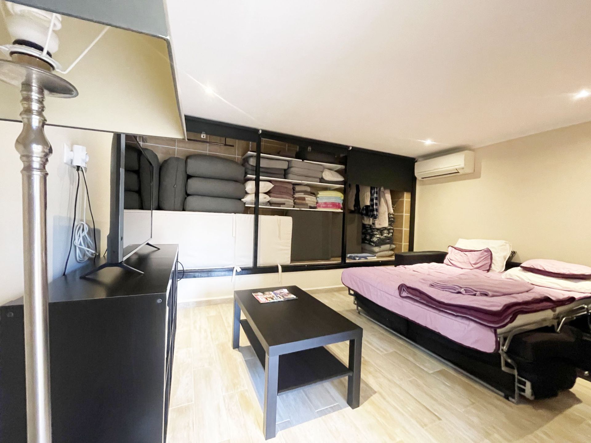 Bedroom lounge space in lower apartment at renovated villa in Calpe