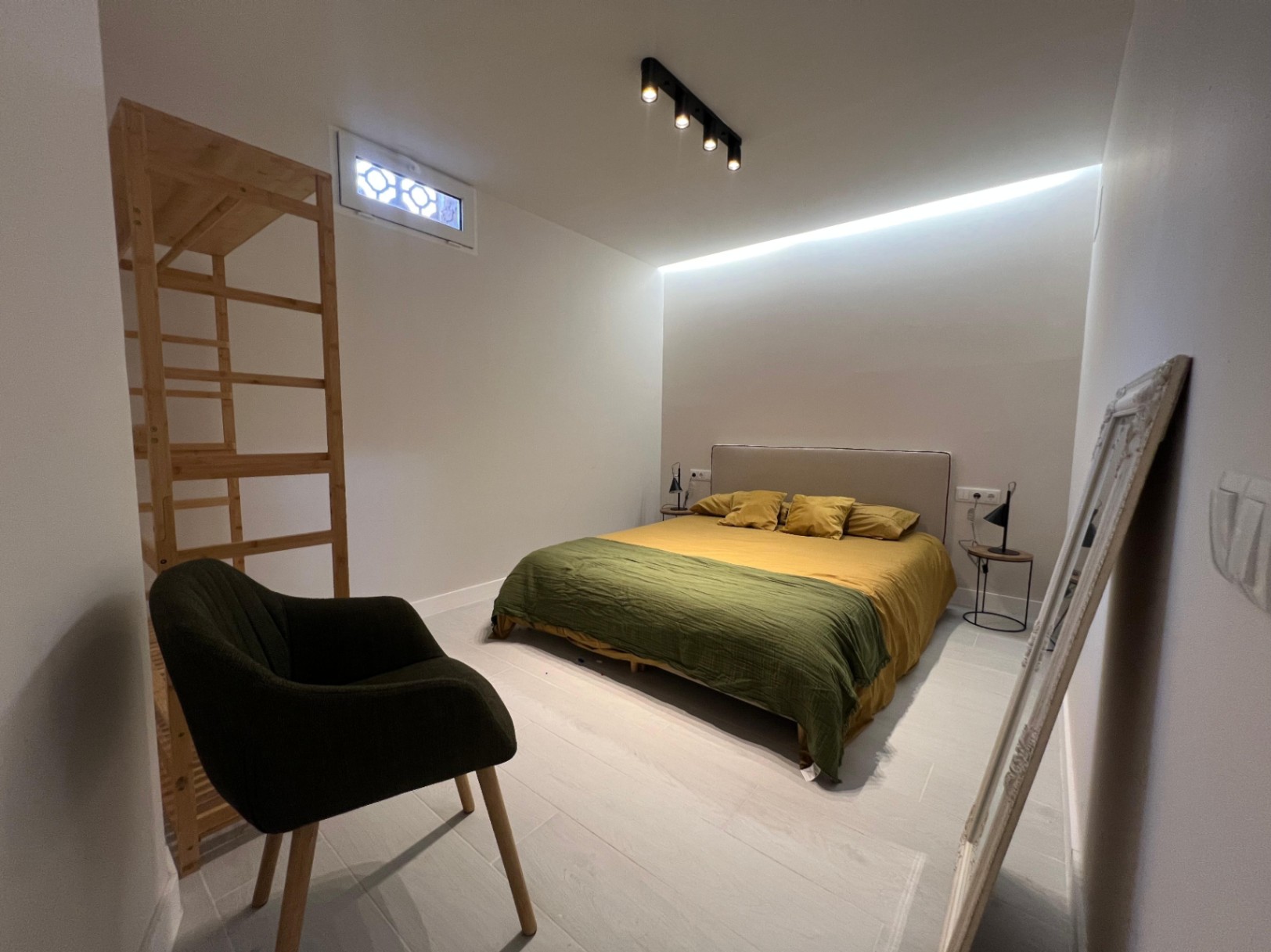 Bedroom on lower level at modern three-level villa in Moraira