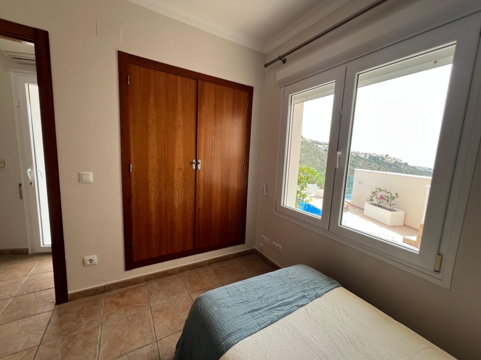 Bedroom with built-in wardrobes at modern villa in Moraira