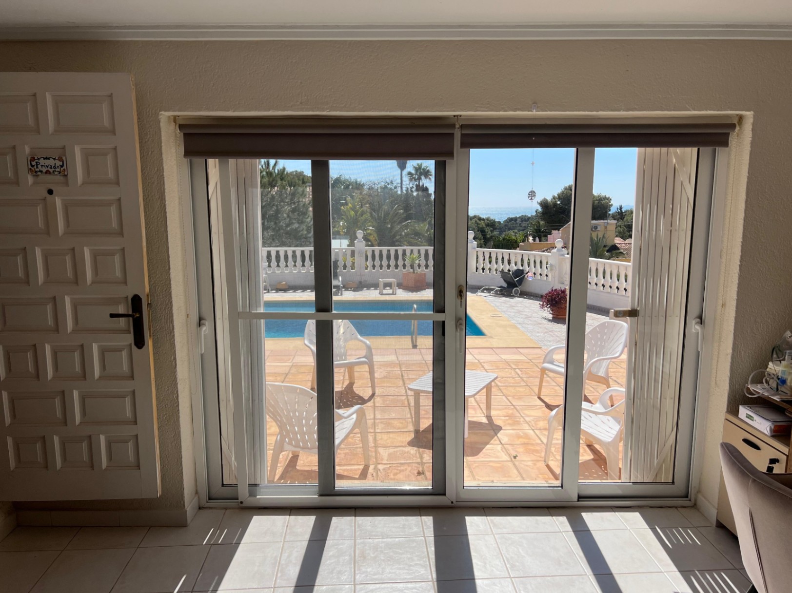 Bedroom with direct access to pool terrace at villa in Benissa