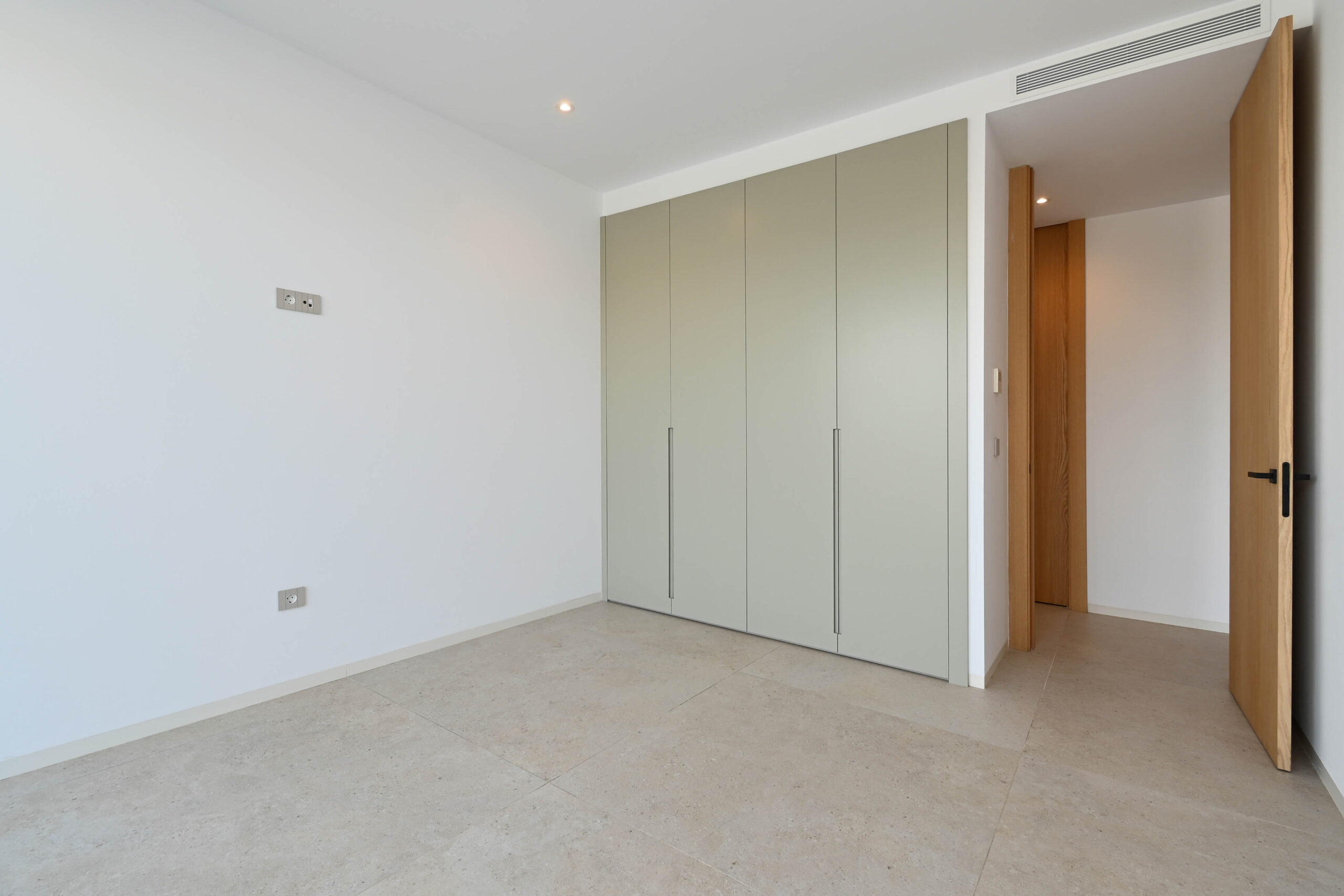 Bedroom with fitted wardrobes at newly built luxury villa in Benissa