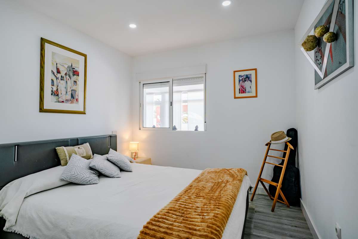 Bedroom with natural light and light modern interior inside a renovated Mediterranean villa in La Cometa, Calpe.