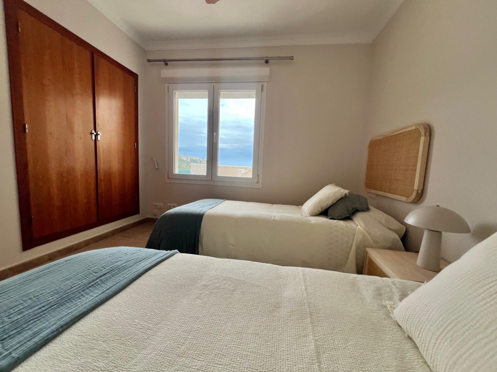 Bedroom with terrace view at modern three-level villa in Moraira