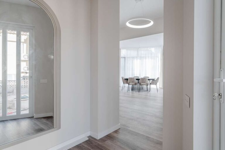 Bright hallway connecting the living and dining areas inside a modern new build villa in Calpe